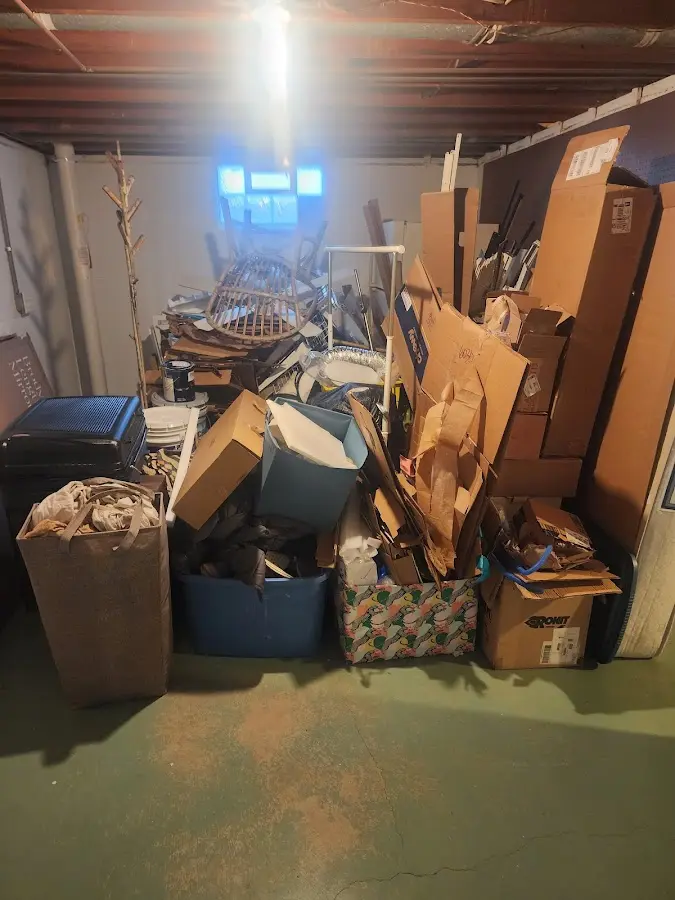 Roll-off dumpster container at job site for 4 Yard Dumpster Rental in Ozark